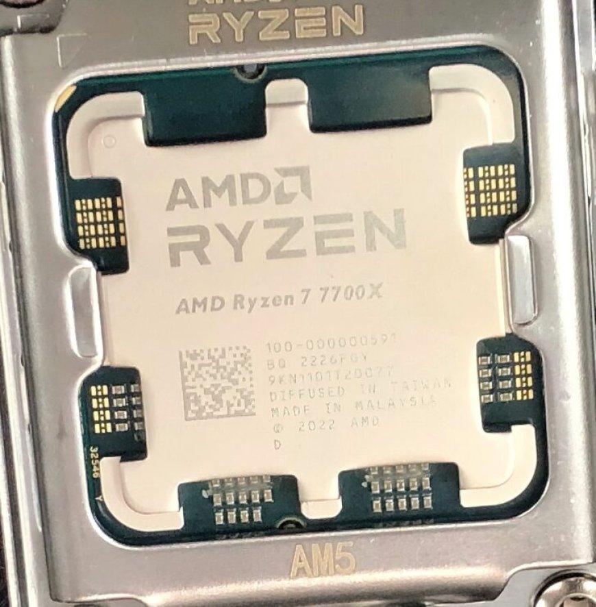 AMD Ryzen 7 7700X 8 Core Zen 4 Desktop CPU Smiles For The Camera